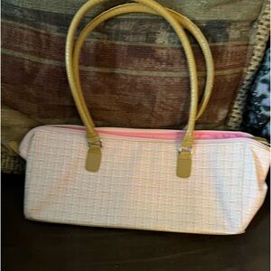 Small, pretty pink bag that goes over your shoulder